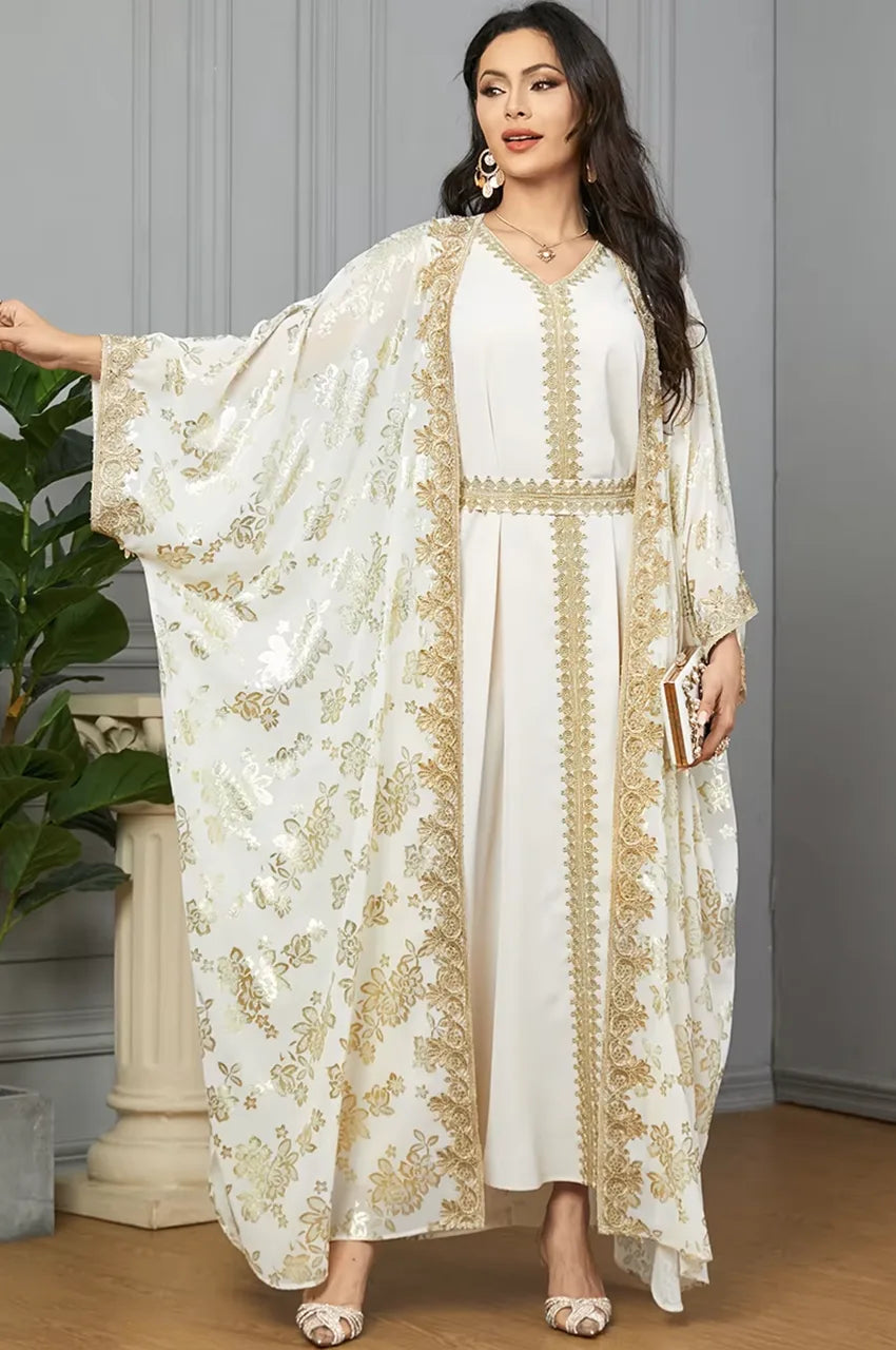 High-end luxury look of the Nehya white and gold floral print kaftan dress.