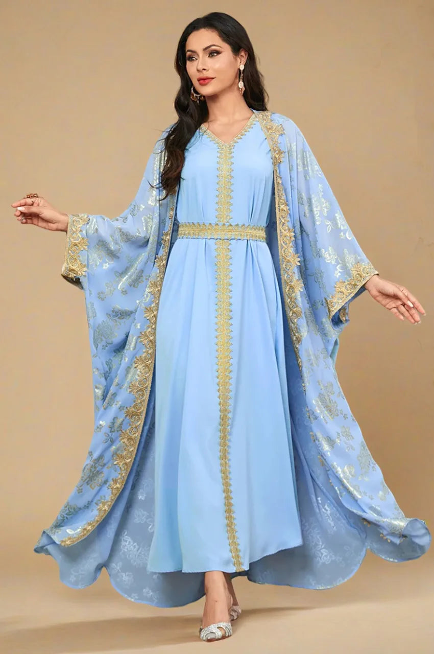 Full-length view of the light blue Arabic kaftan abaya with gold floral embroidery.
