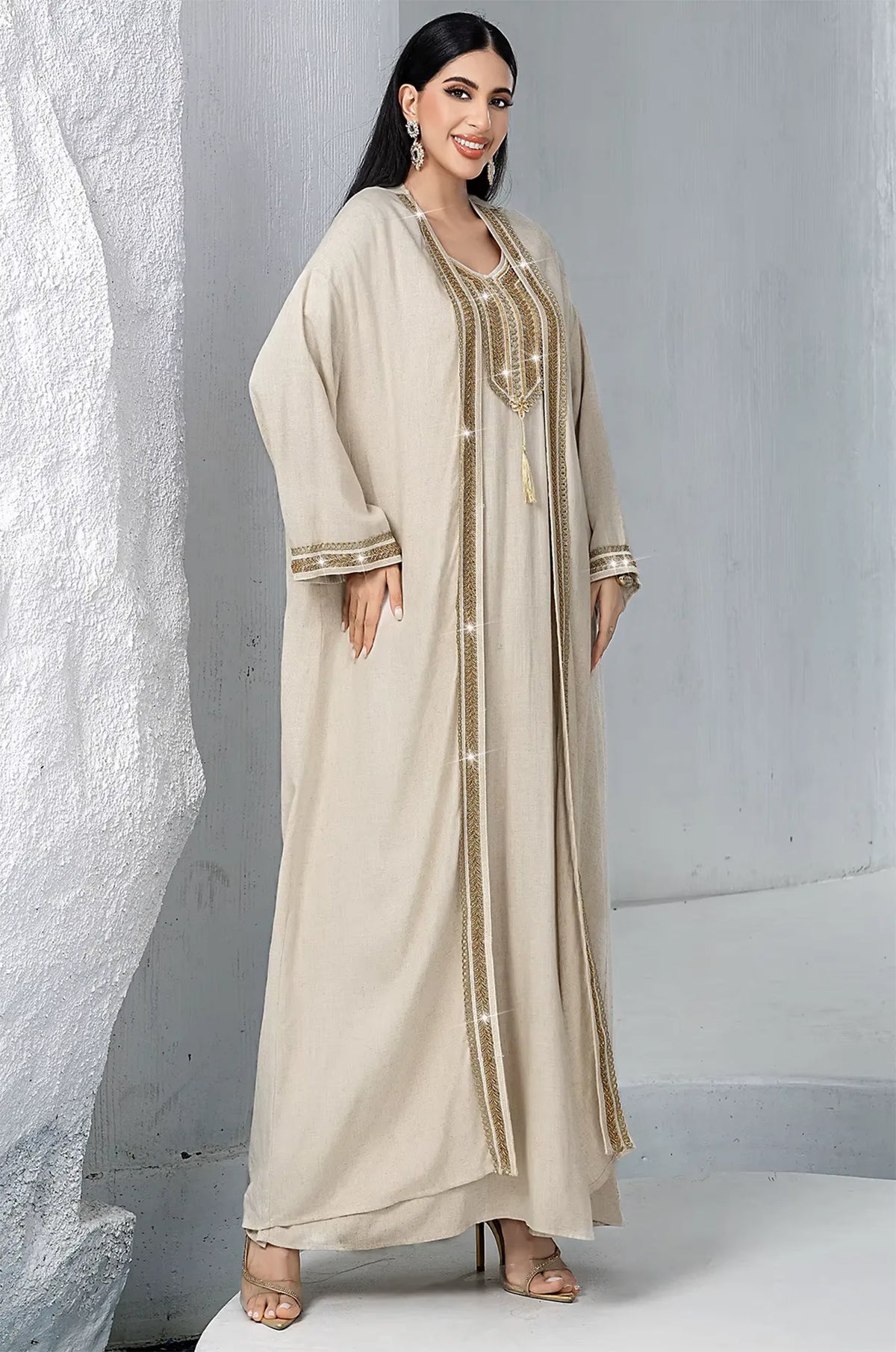 Elegant full-length pose of the Ninon linen kaftan at Naylara boutique.