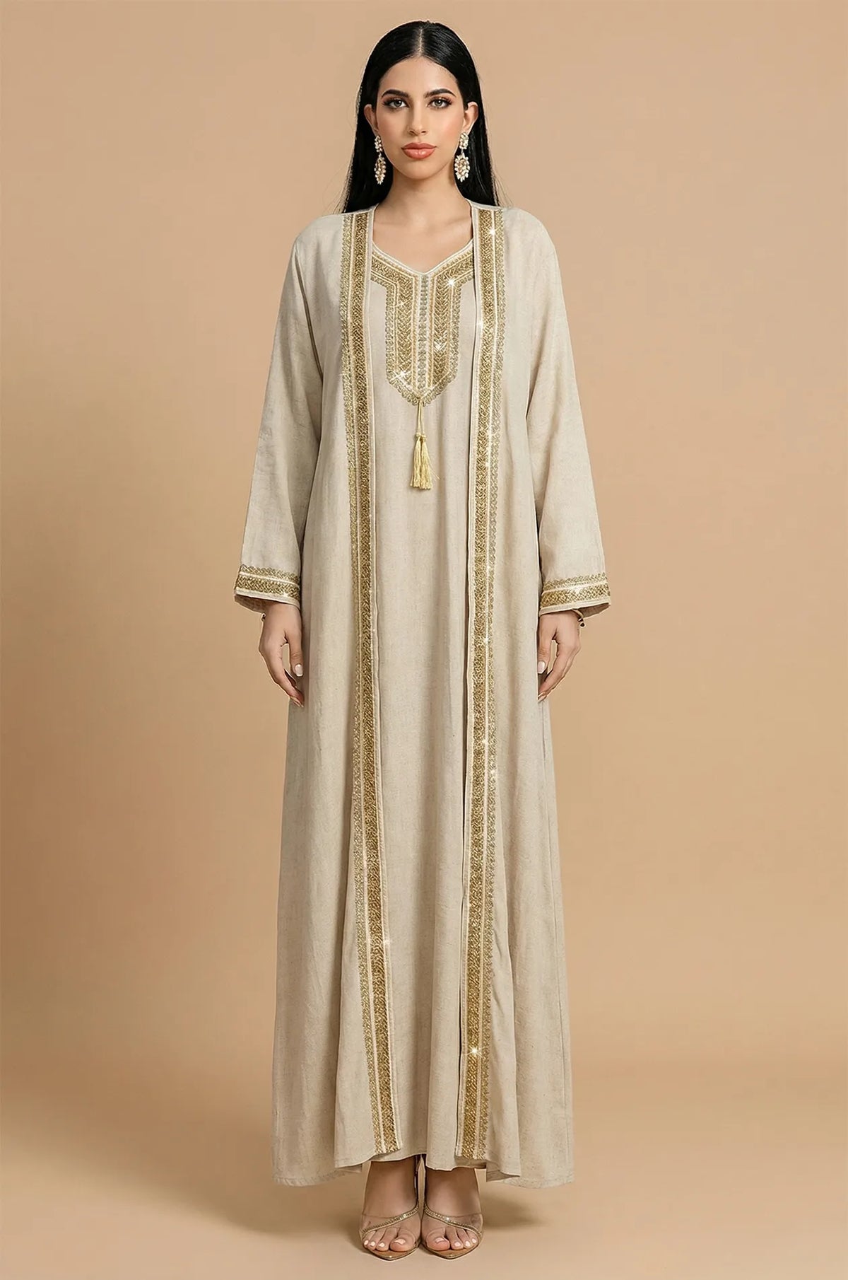 Full front view of Ninon plus size linen kaftan in beige with gold embroidery.