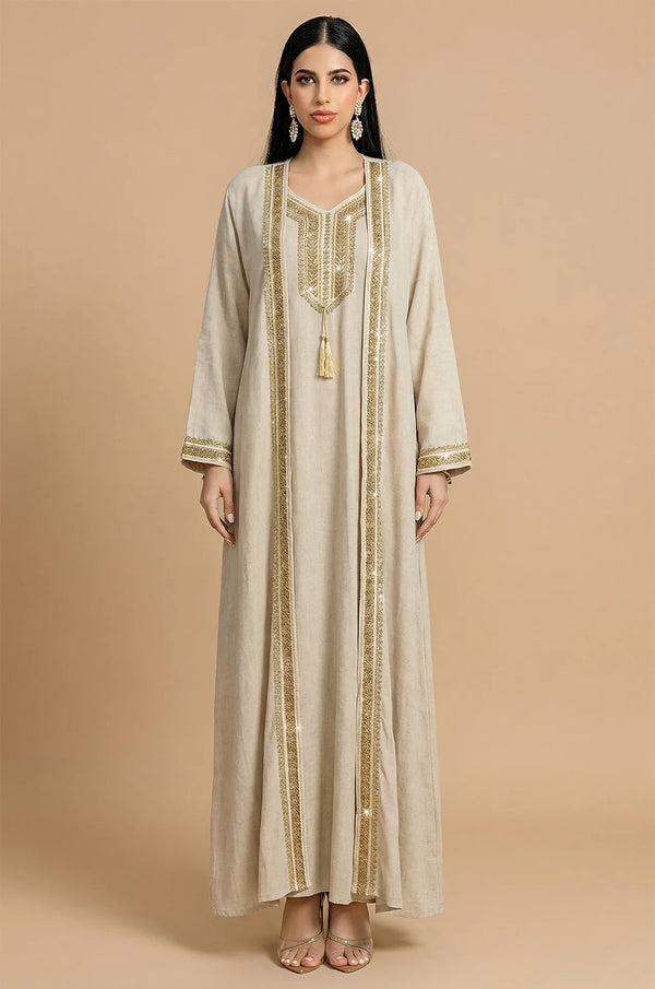 Full front view of Ninon plus size linen kaftan in beige with gold embroidery.