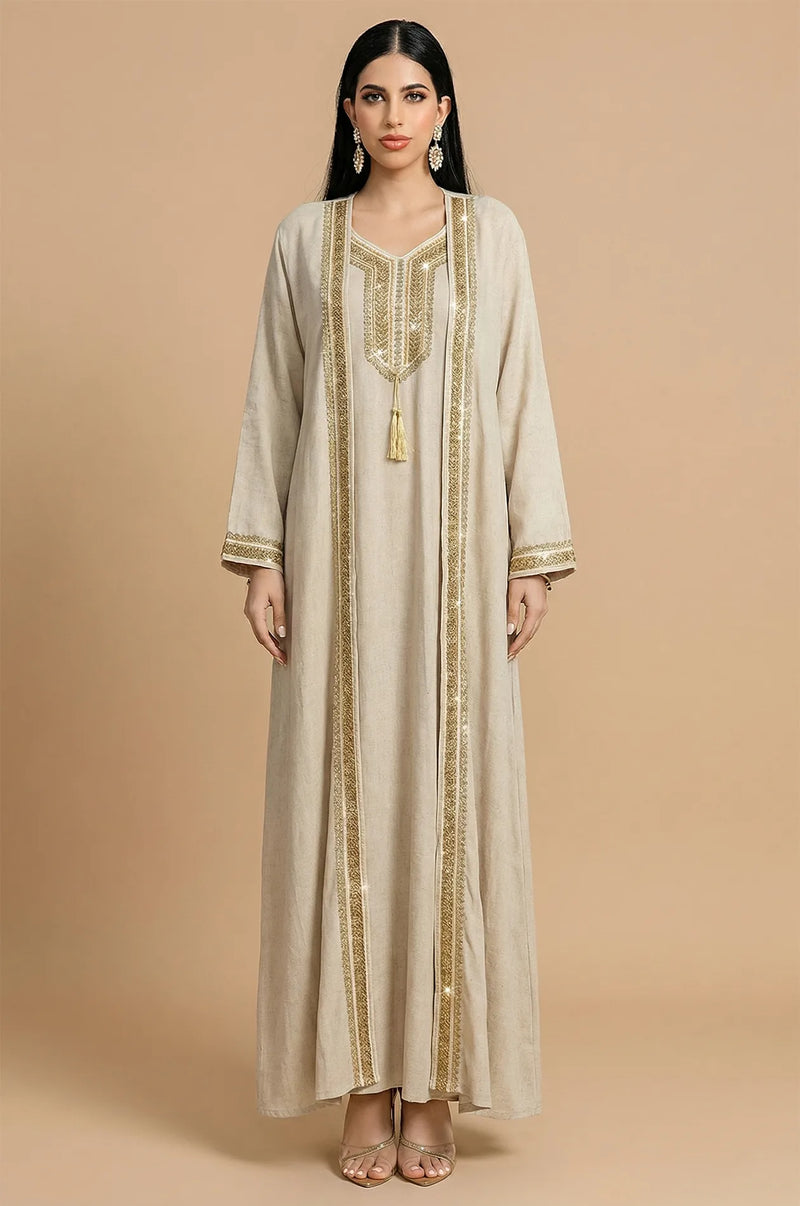 Full front view of Ninon plus size linen kaftan in beige with gold embroidery.