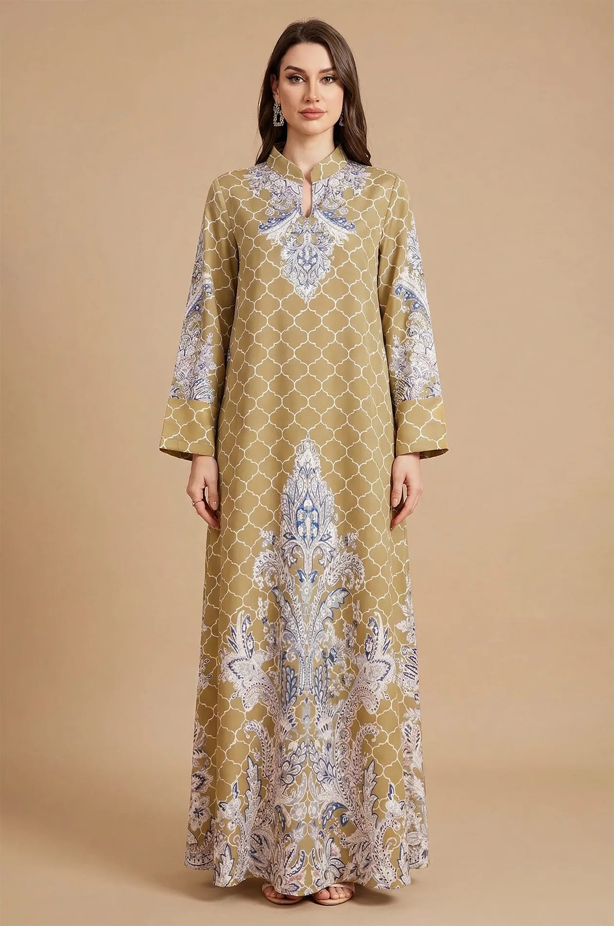 Clear studio frontal shot of the Nirea yellow paisley print kaftan on a neutral background for an accurate product representation.