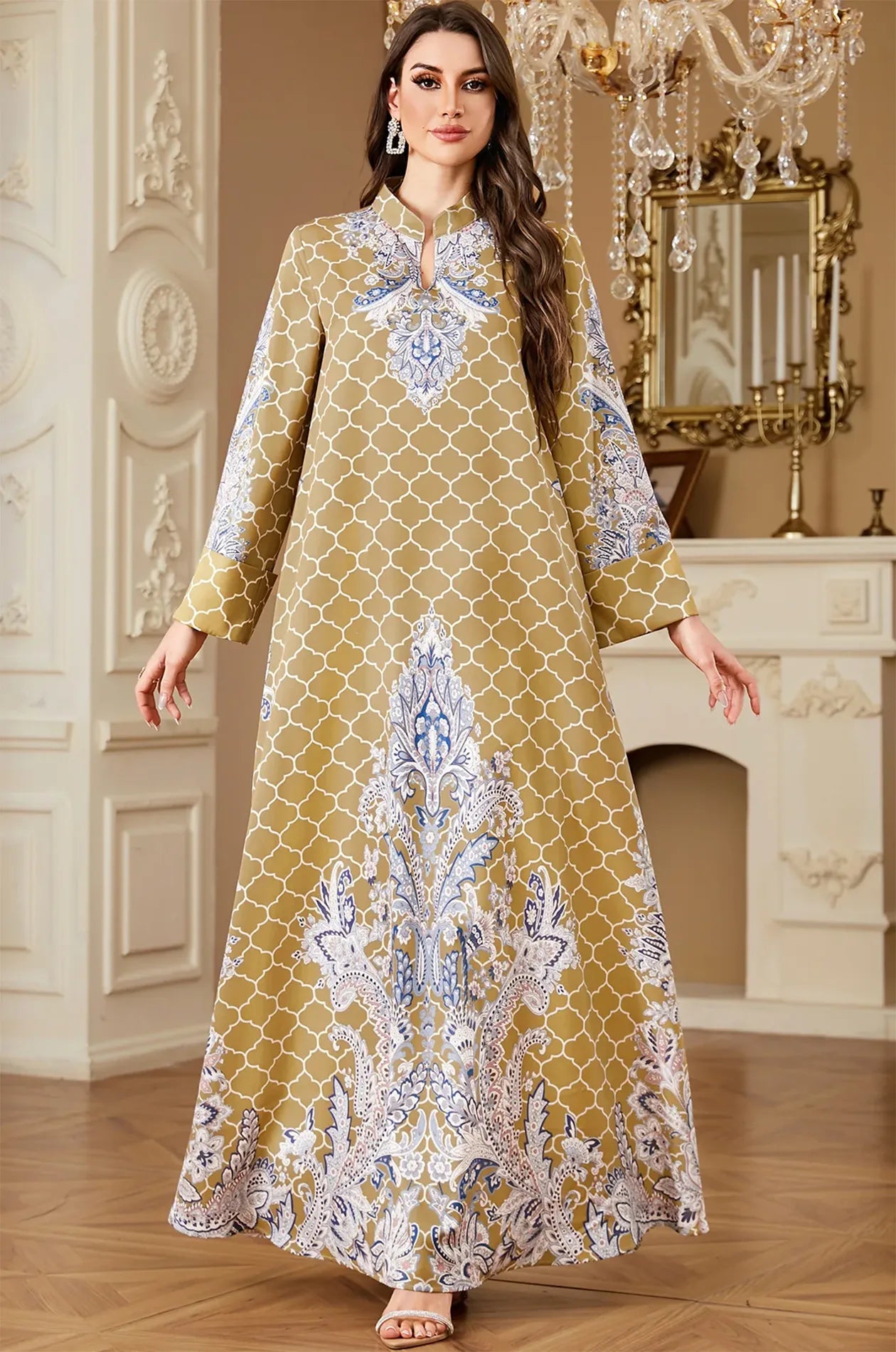 Full front view of the Nirea yellow paisley print kaftan featuring a mandarin collar and intricate blue floral detailing.