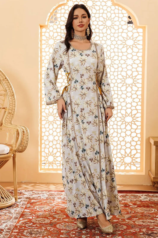 Portrait view of the Nysria boho kaftan maxi dress with traditional jewelry.