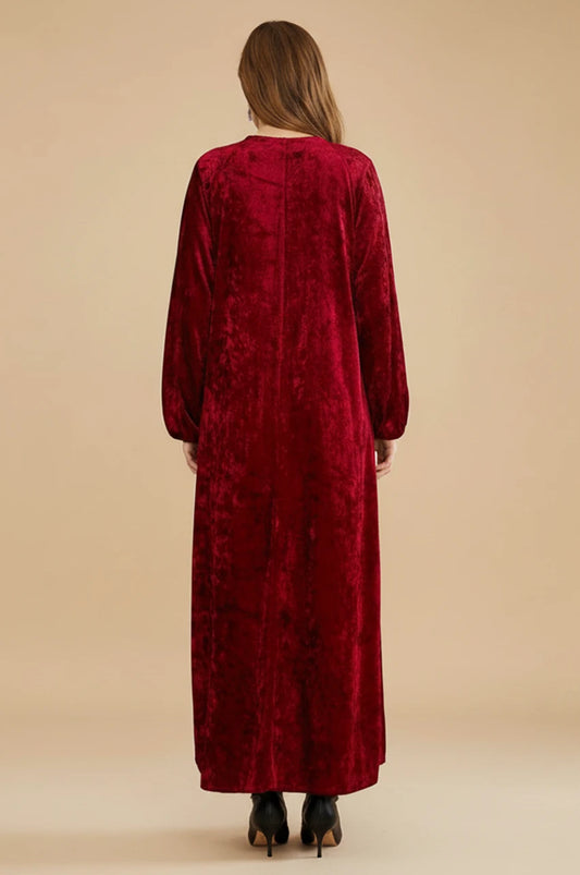 Back view of the long sleeve ruby velvet kaftan dress.