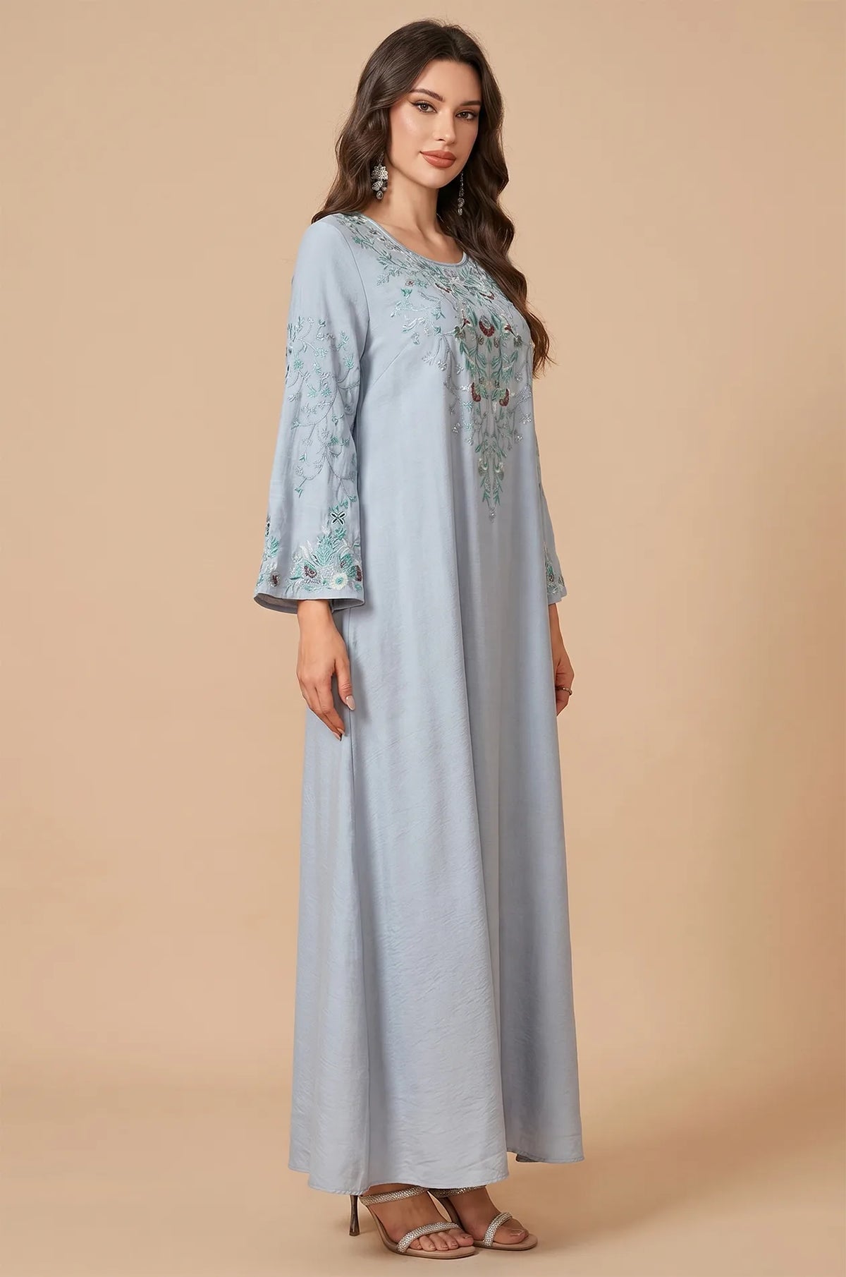 Side view of the Petra dusty blue kaftan highlighting the flared sleeves.