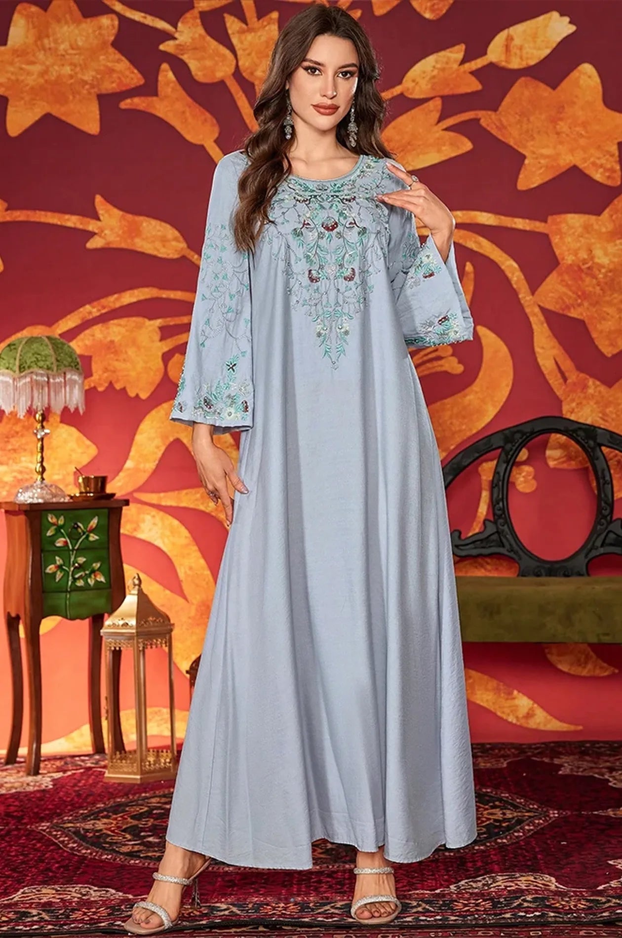 The Petra kaftan showcased in a luxurious oriental-inspired setting.