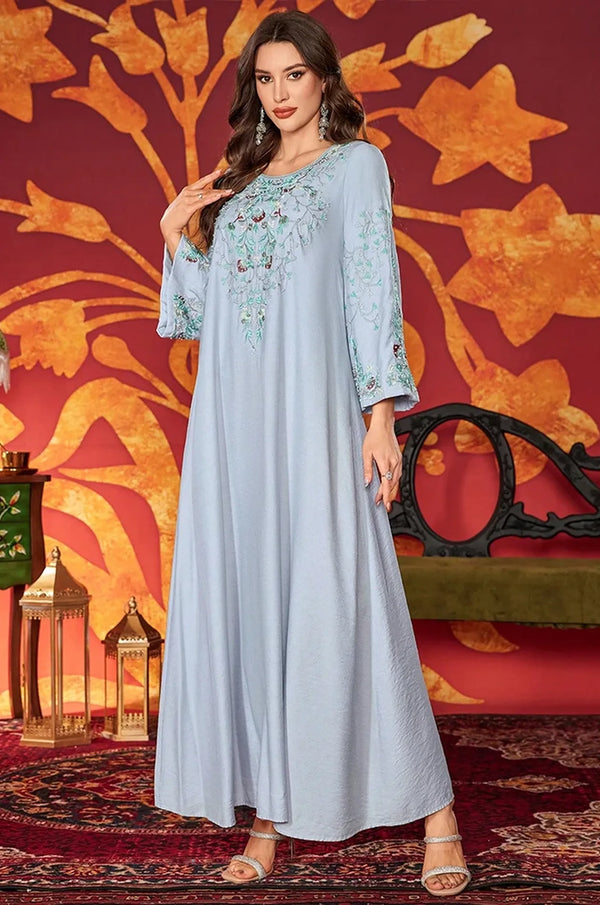 Full-length silhouette of the Petra kaftan for formal occasions.