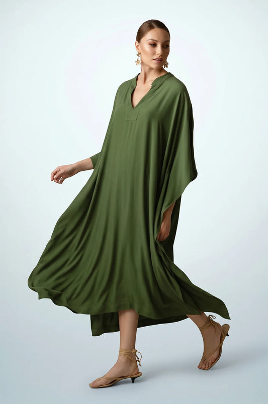 Olive green plain kaftan in motion showing fluid drape