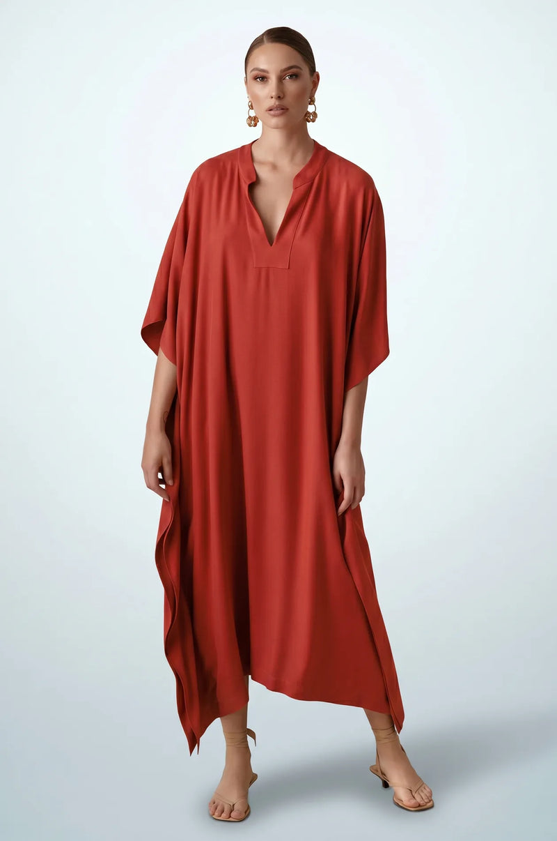 Full length front view of terracotta orange minimalist plain kaftan