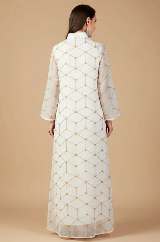 Back view of Rahel floor-length white dress showing continuous gold grid pattern.