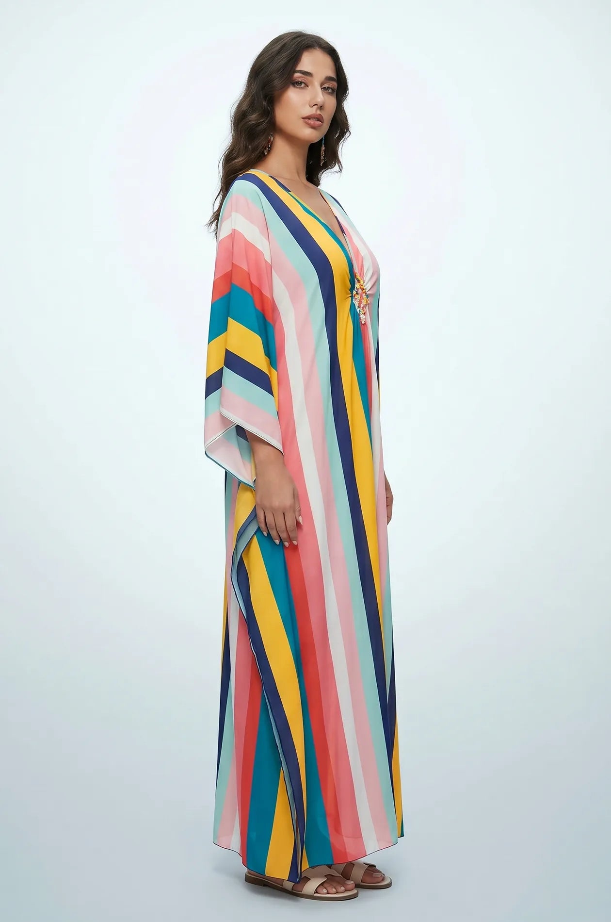 Side profile of multicolor striped rainbow kaftan with kimono sleeves