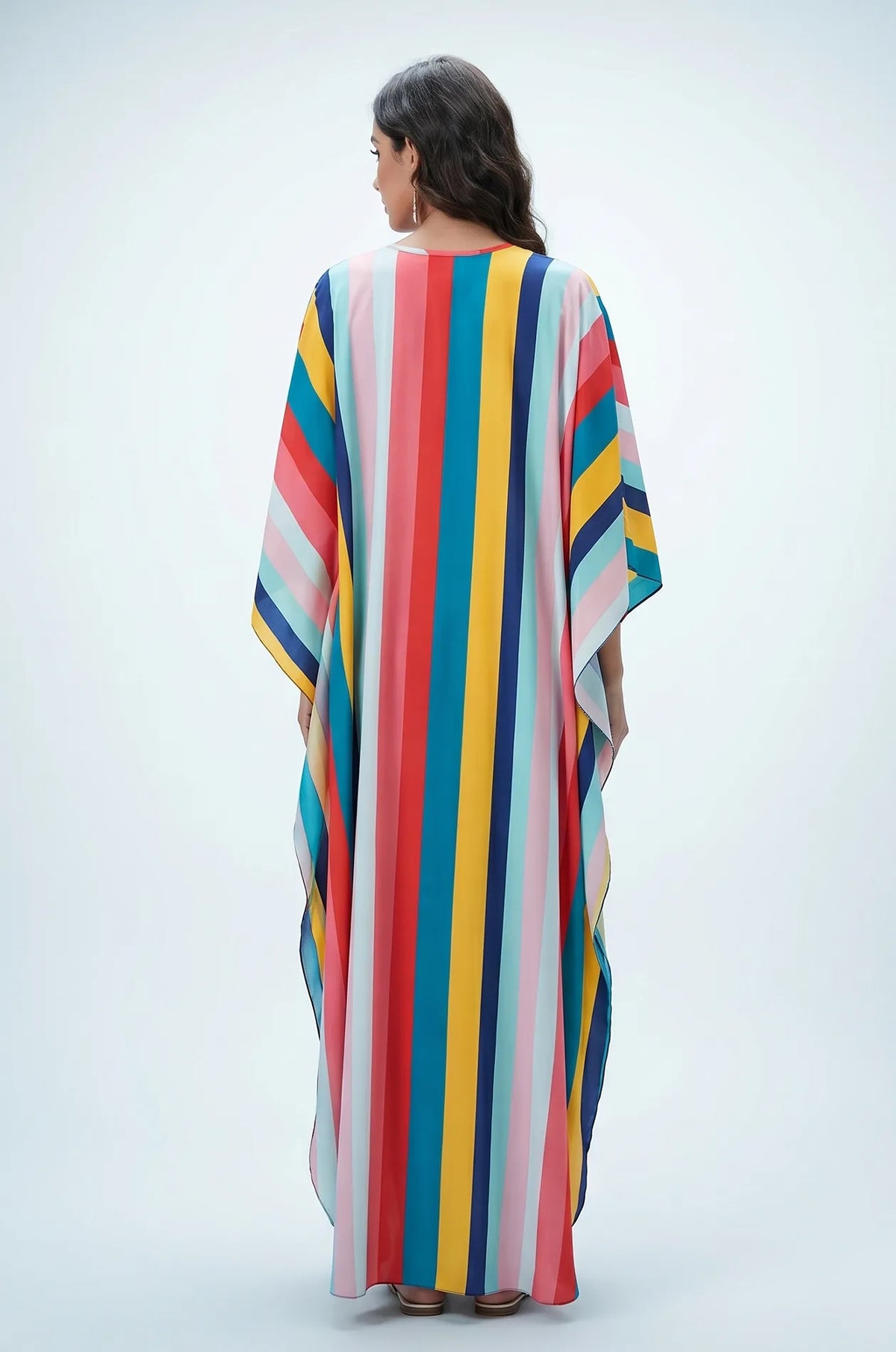 Studio back view of multicolor rainbow striped beach kaftan