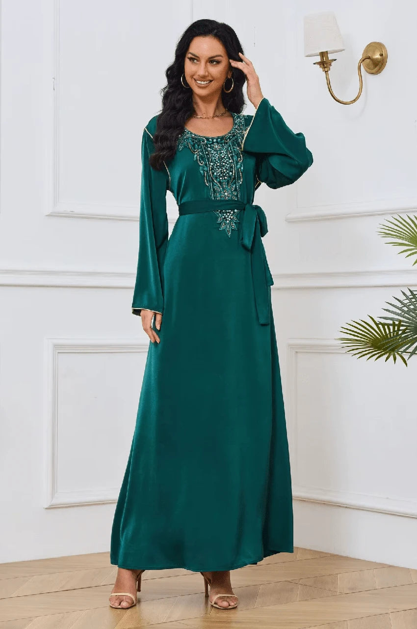 Close-up of embroidered neckline and belt on Ranya dark green cotton long kaftan