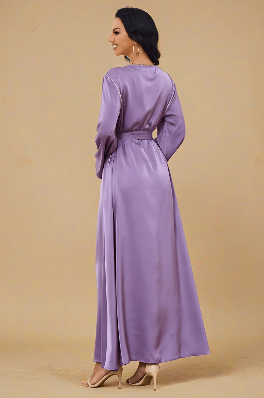 Back angle view of Ranya purple cotton long kaftan showing flowy drape