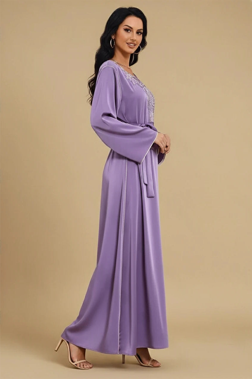 Side view of Ranya purple cotton long kaftan with flared sleeves and waist tie