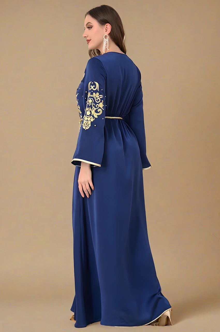 Side and back view of blue and gold Rayah kaftan with belt