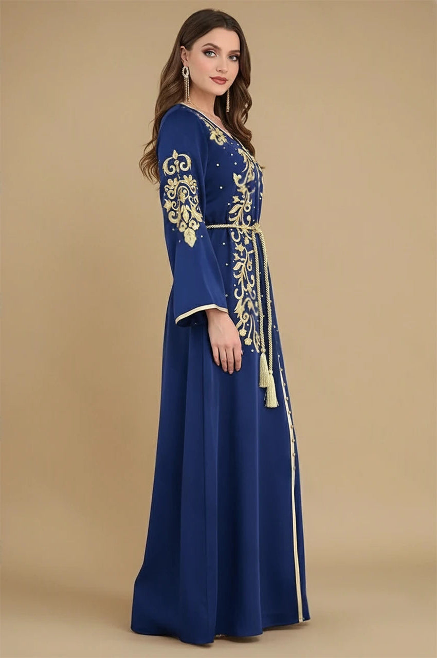 Rayah blue and gold kaftan side view with intricate golden embroidery