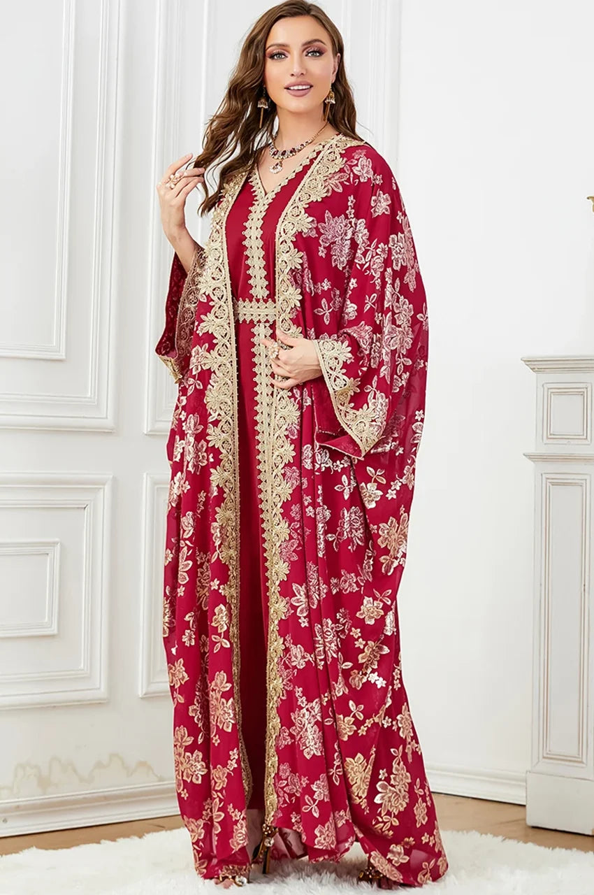 Nehya red and gold kaftan dress shown in an open style with intricate embroidery.