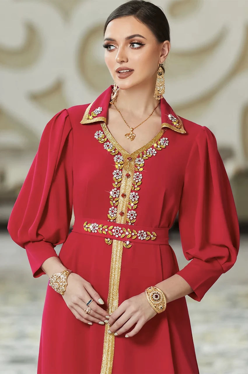 Detailed view of the Karia red kaftan bodice highlighting the crystal-embellished collar and traditional gold sfifa placket.
