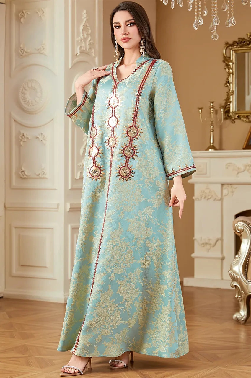 Model posing in Riyah kaftan showing the fluid movement of the A-line cut.