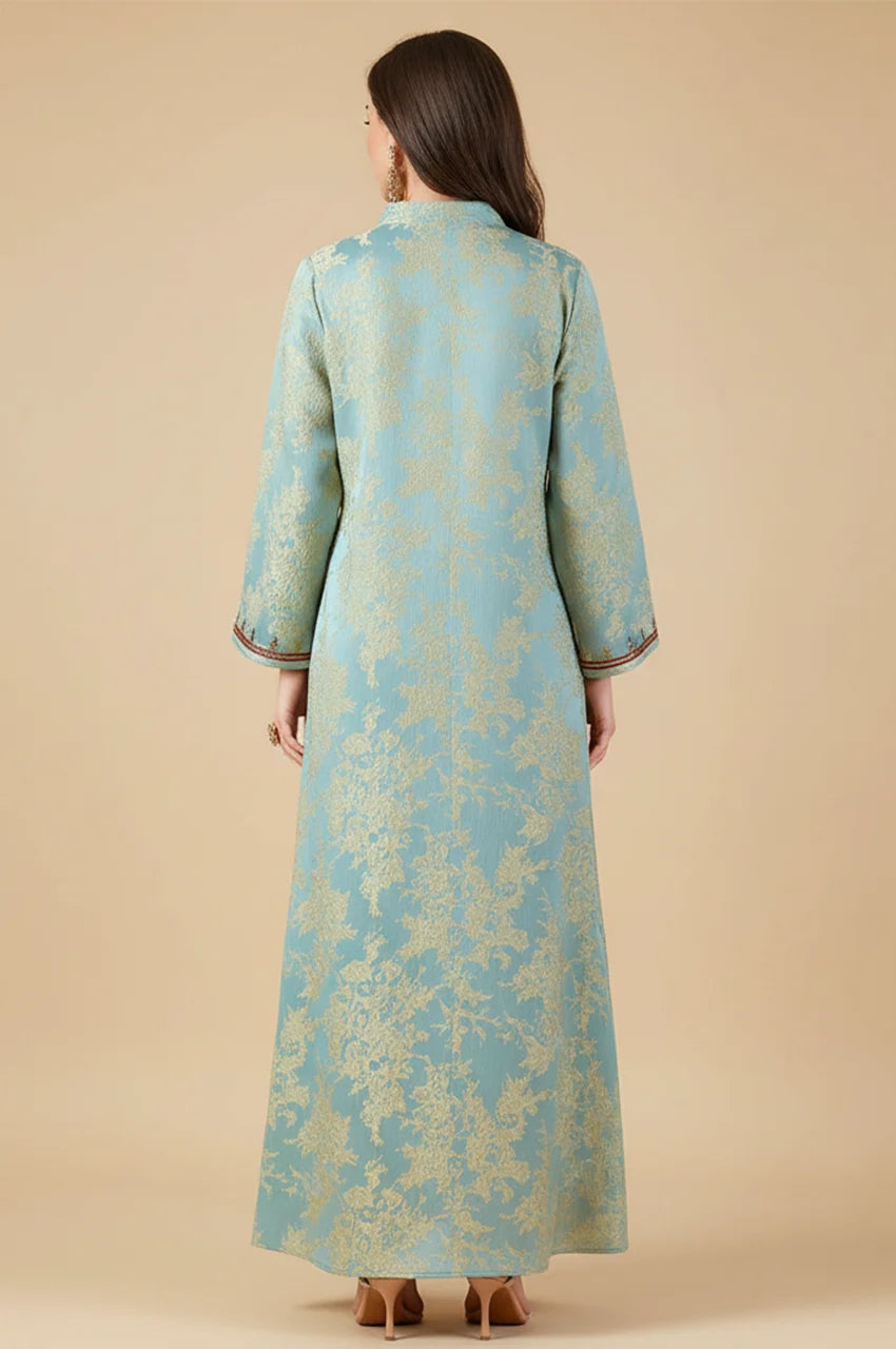 Back view of the Riyah kaftan showing the seamless flow of the floral jacquard fabric.