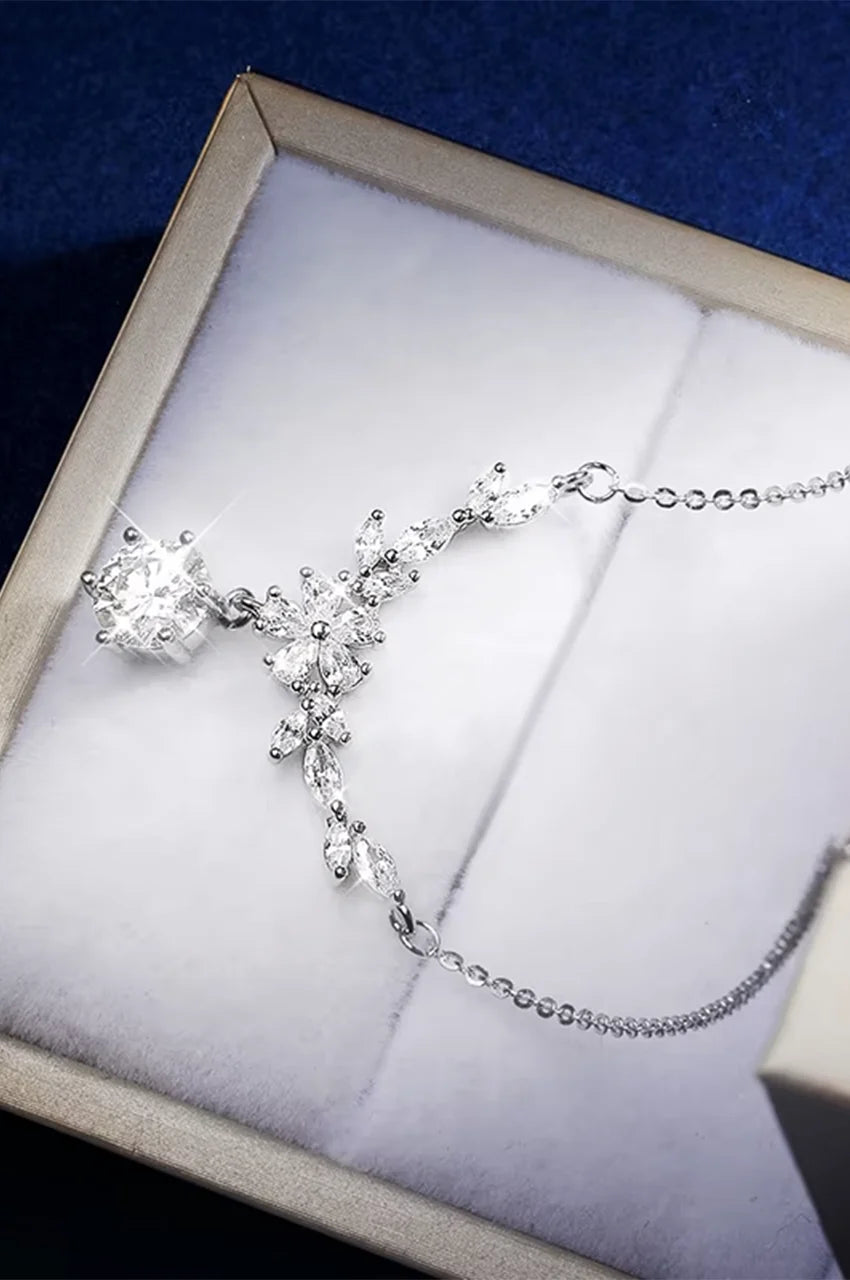 Close up of brilliant round cut cubic zirconia pendant drop in white box