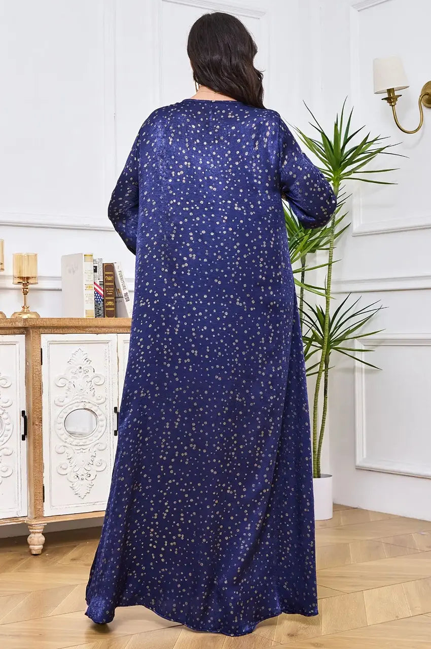 Rear view of the Sabria velvet dress in a room setting.