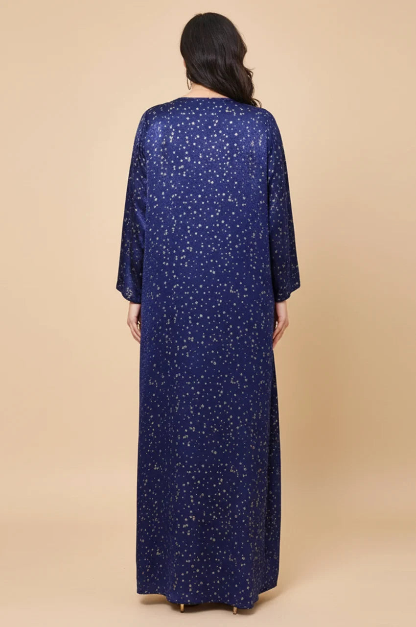 Back view of the Sabria blue velvet kaftan showing sparkle fabric texture.