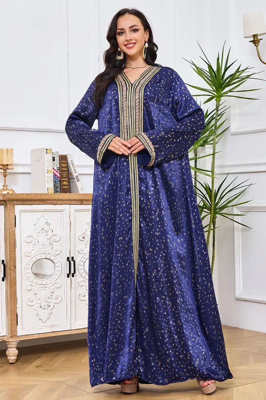 Model wearing Royal Blue Sabria kaftan in a lifestyle setting.