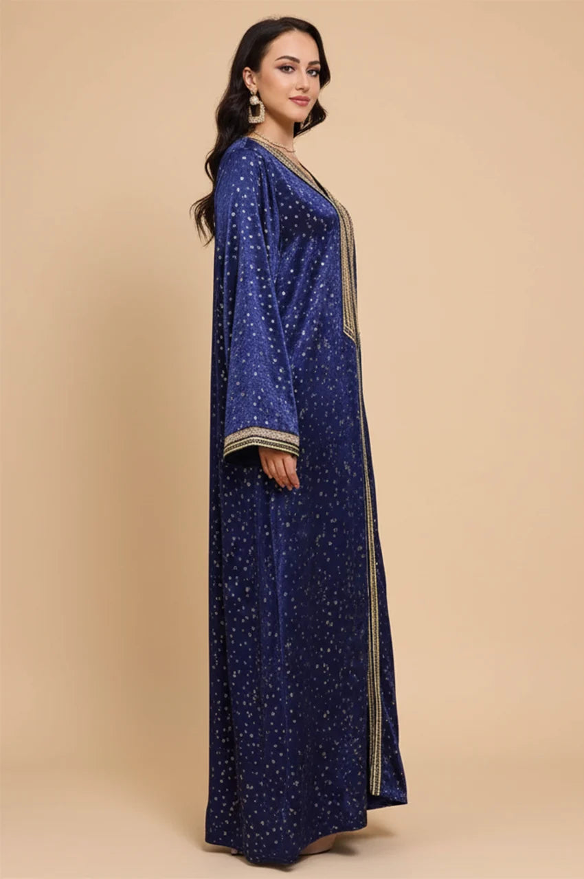 Side profile of the Sabria kaftan dress highlighting the sleeve detailing.