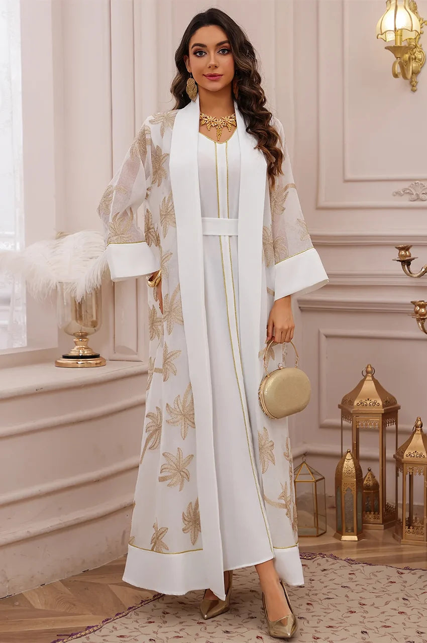 SAELA white palm tree kaftan styled as a modest bridal or Nikah ceremony outfit.