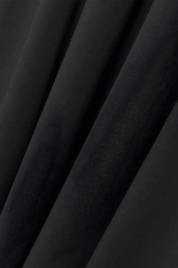 Close-up of lightweight black fabric used in SAHIRA Embroidered Beach Kaftan