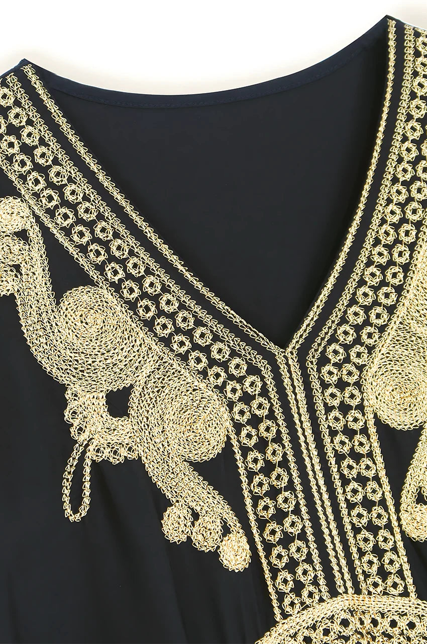 Close-up of hand embroidery on neckline of SAHIRA Black Embroidered Beach Kaftan