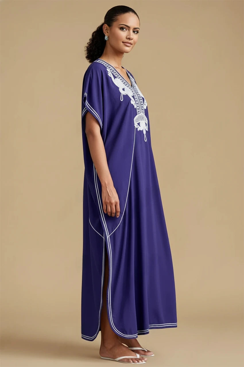 Side slit view of SAHIRA Blue Embroidered Beach Kaftan showing white detailing