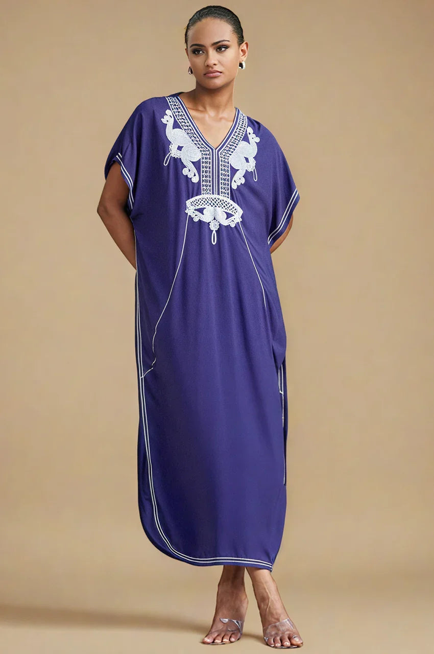 Model wearing SAHIRA Blue Embroidered Beach Kaftan, studio side profile