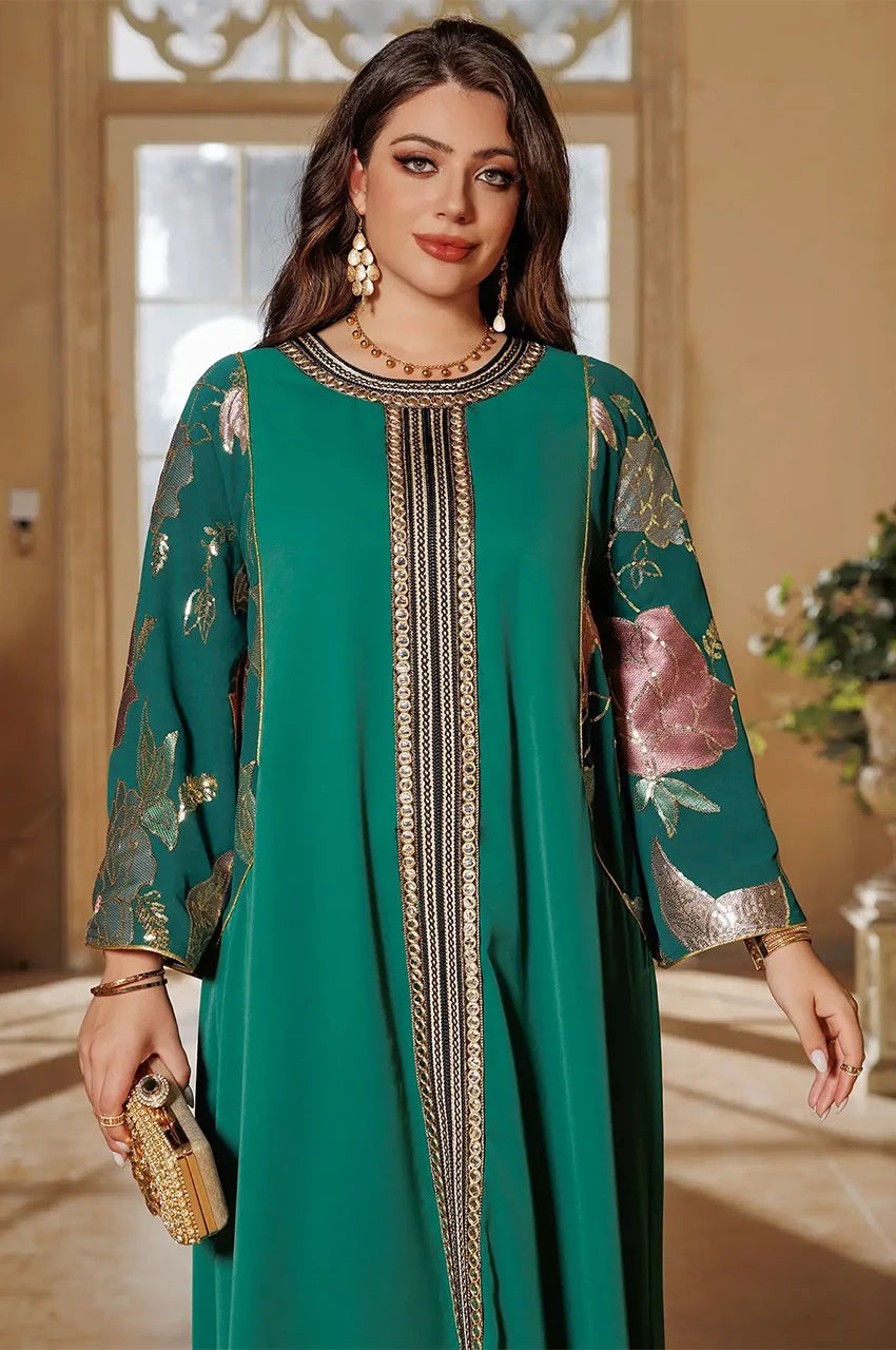 Close-up of neckline and embroidered detailing on Samira Green Pakistan Kaftan