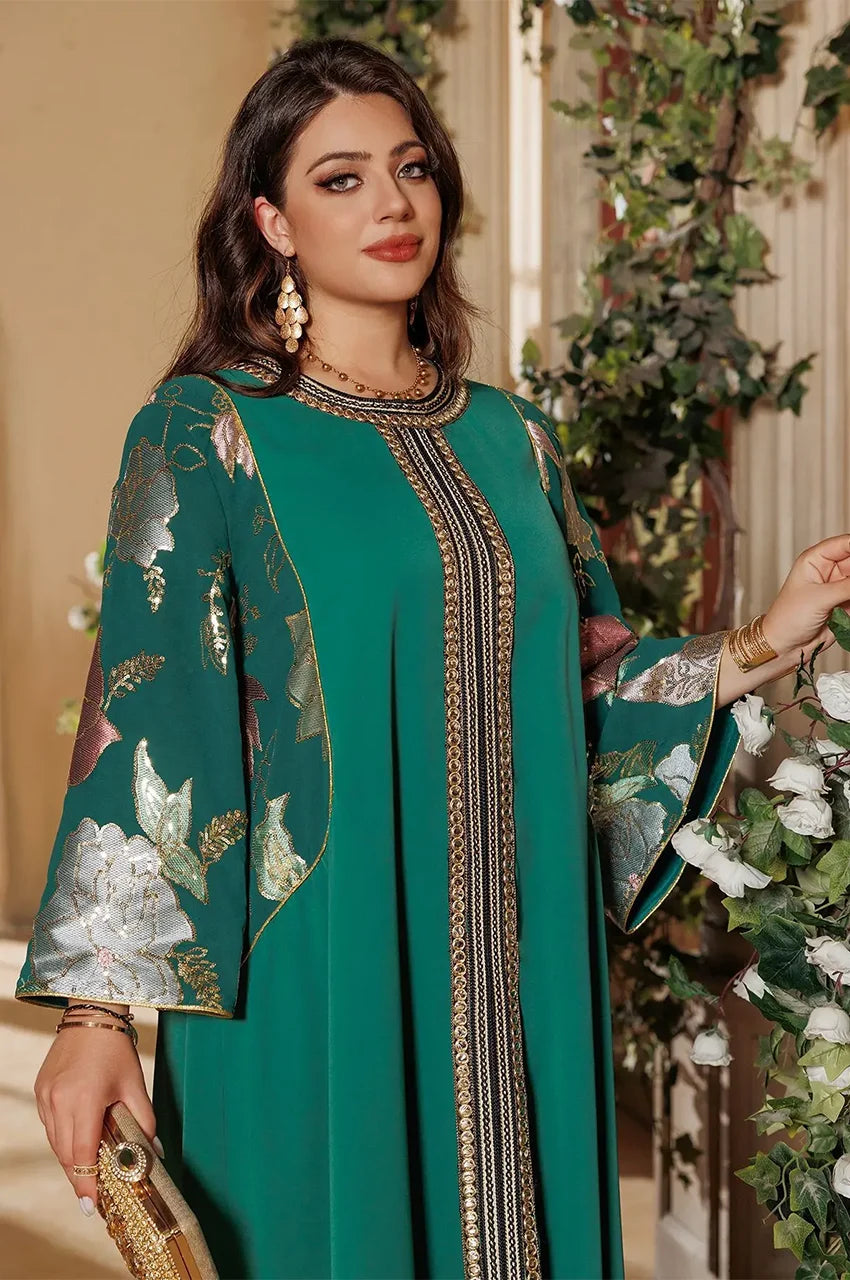 Detailed view of metallic floral sleeves on Samira Green Pakistan Kaftan