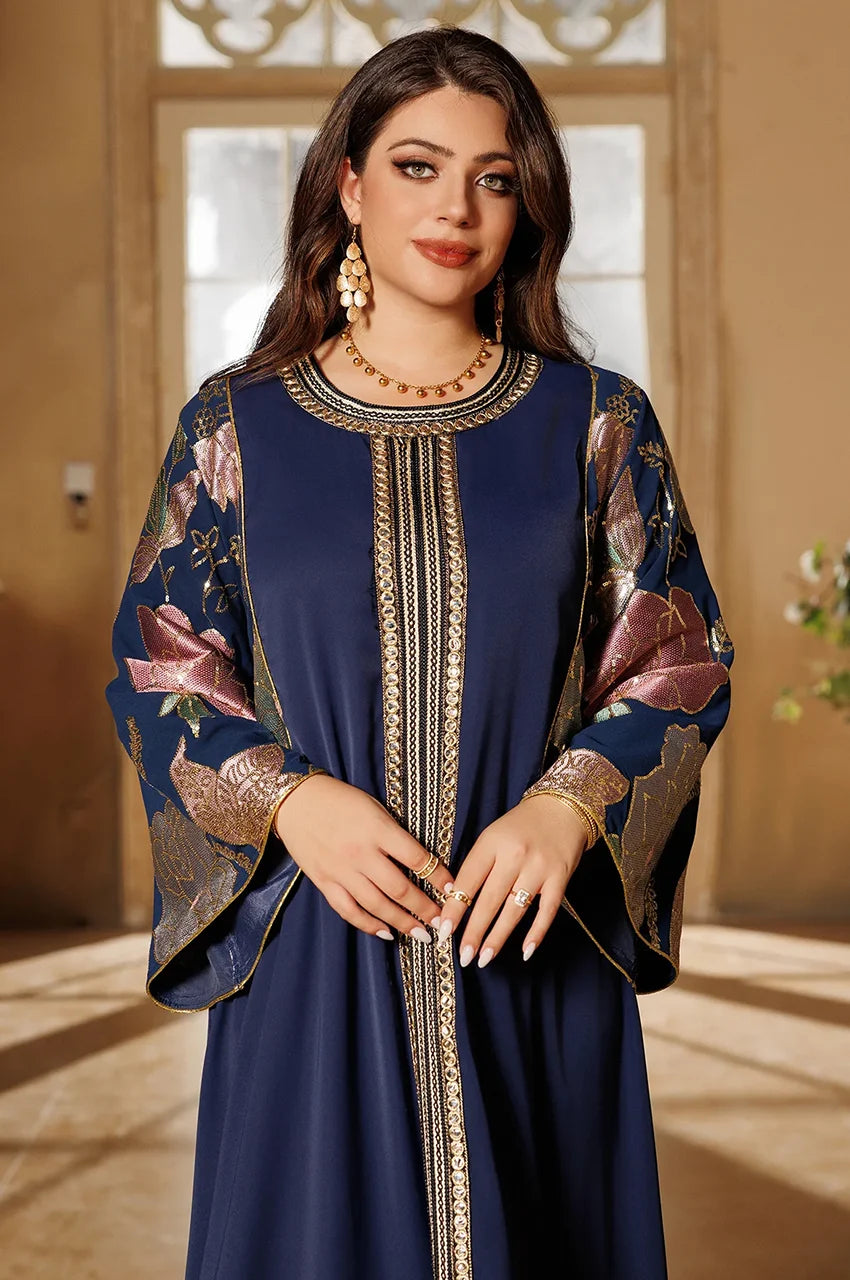 Close-up of neckline and gold embroidery on Samira Royal Blue Pakistan Kaftan with detailed floral sleeves.