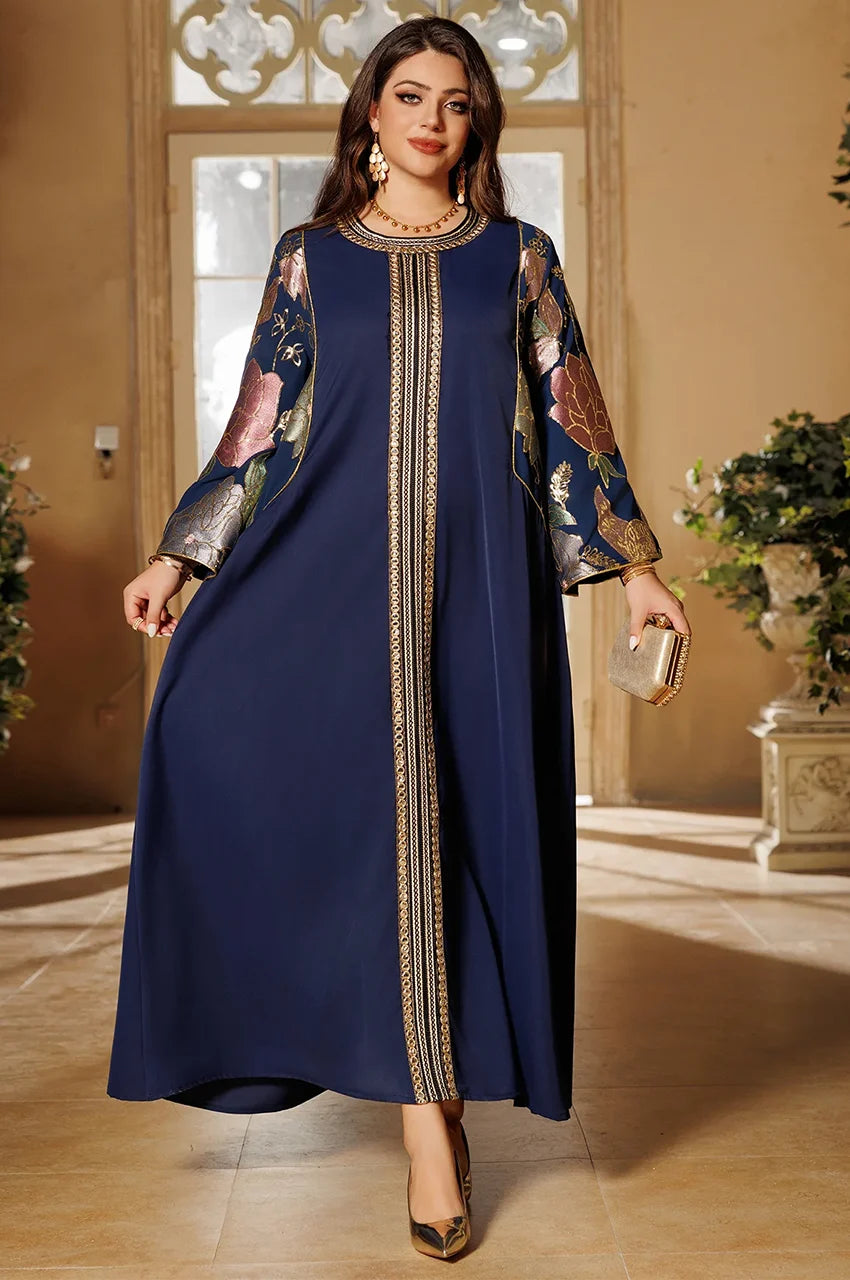 Full-length Samira Pakistan Kaftan in Royal Blue, floral brocade sleeves, closed front, modest luxury dress.
