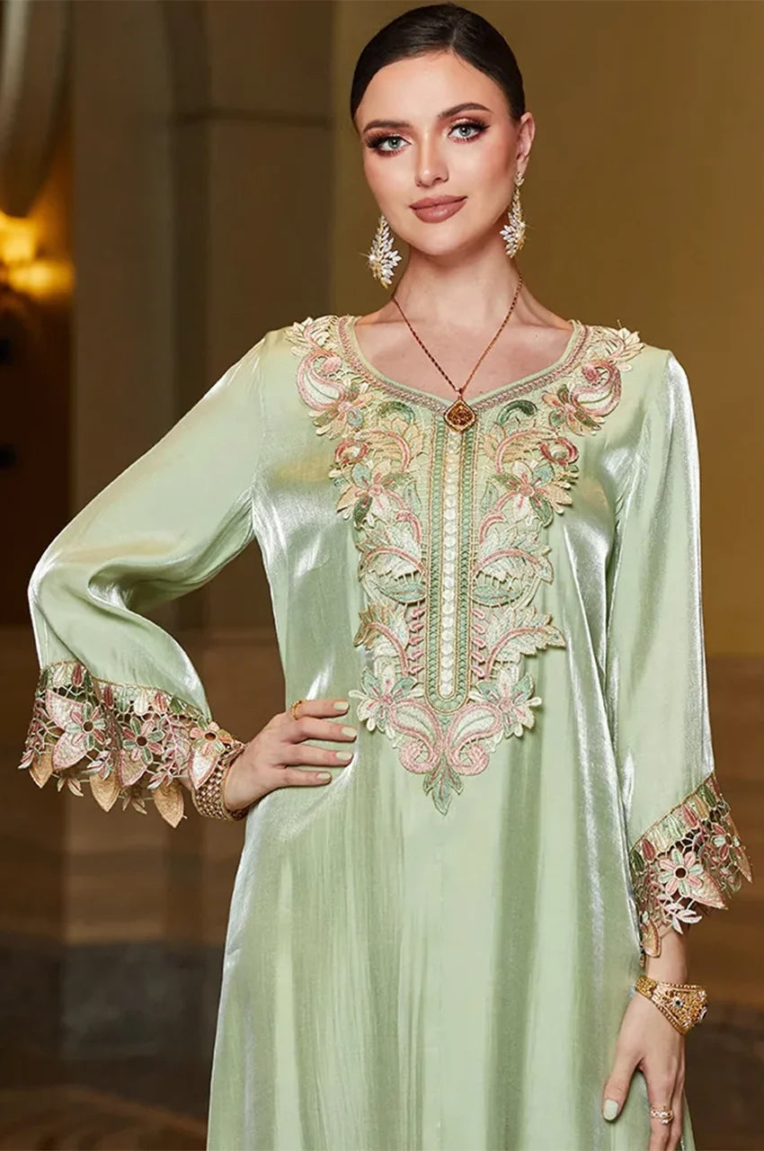 Close-up of embroidered neckline on Sarai mint green satin silk kaftan