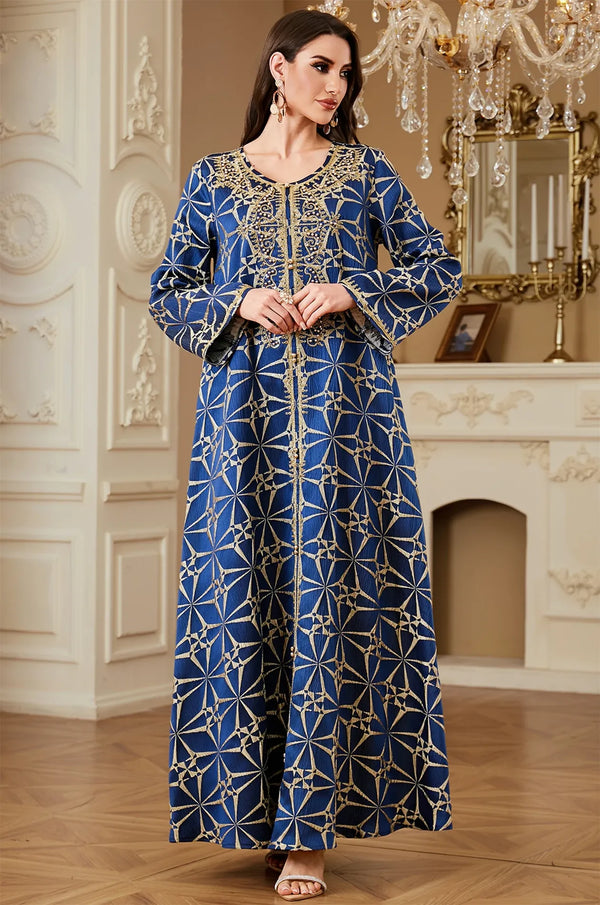Formal front pose of the Selas Blue textured kaftan dress with hands clasped, highlighting the modest A-line silhouette.