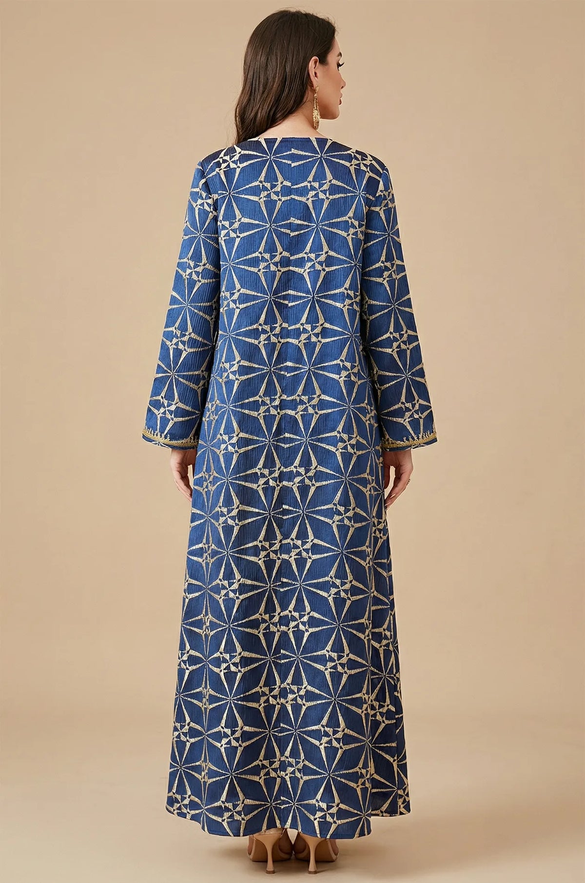 Full back view of the Selas Royal Blue textured kaftan dress showing the continuous geometric starburst pattern.