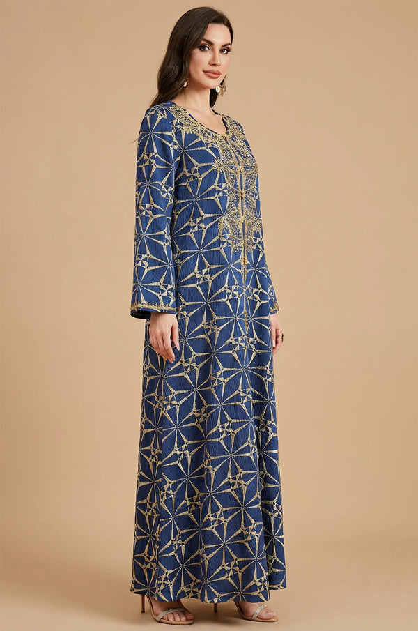 Side profile view of the Selas Blue textured kaftan dress on a neutral studio background.