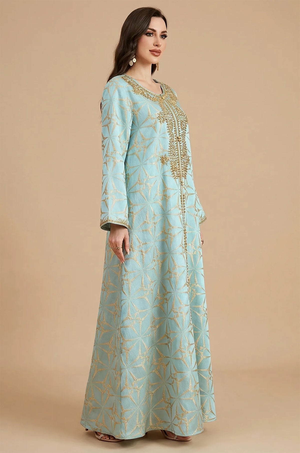 Side profile view of the Selas Light Green textured kaftan dress by Naylara with gold embroidery.