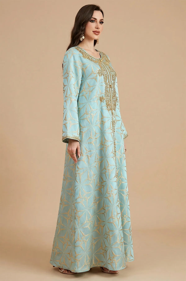 Side profile view of the Selas Light Green textured kaftan dress by Naylara with gold embroidery.
