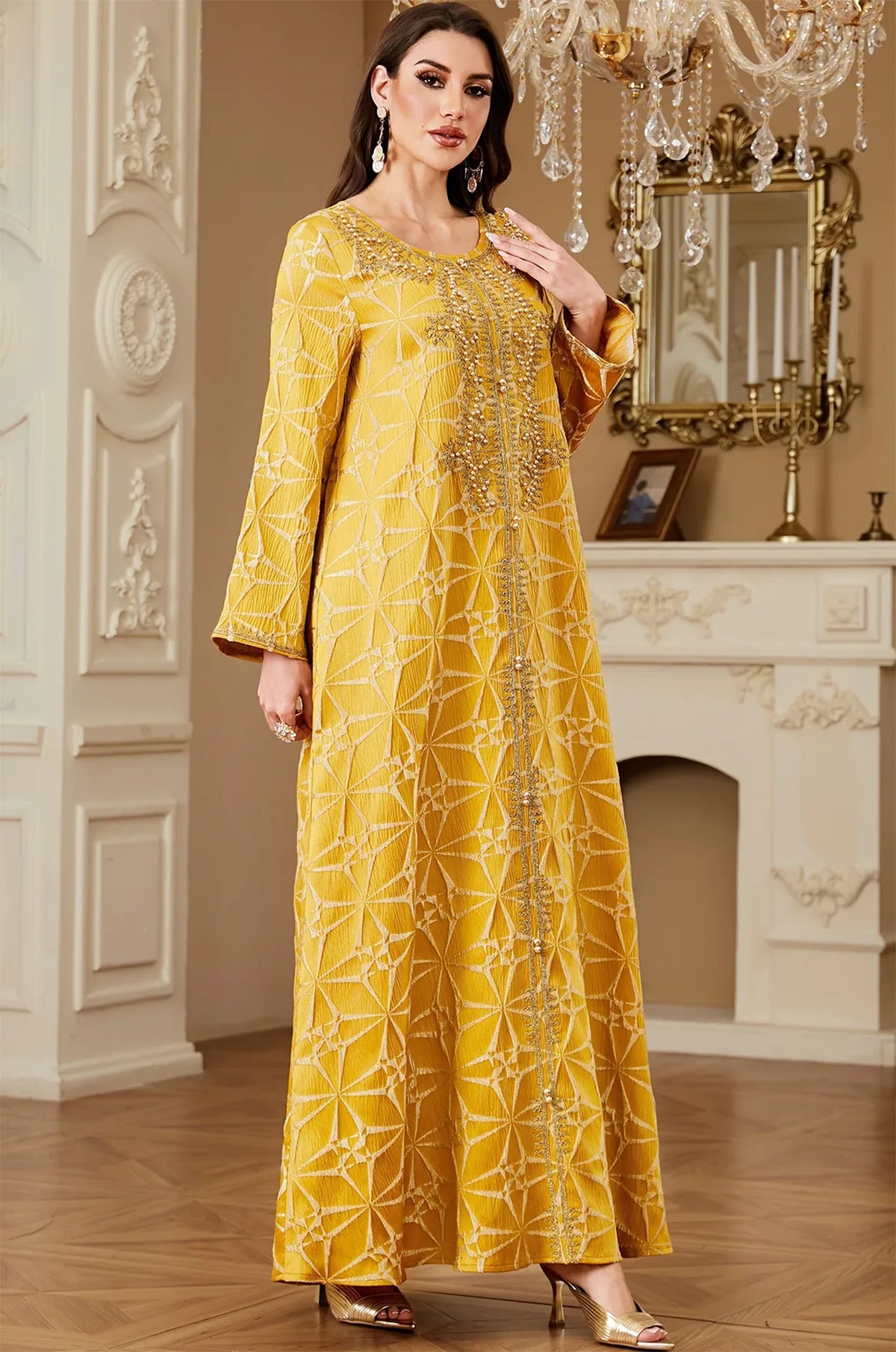Side view of the Selas Yellow textured kaftan dress showing the elegant movement of the A-line silhouette.