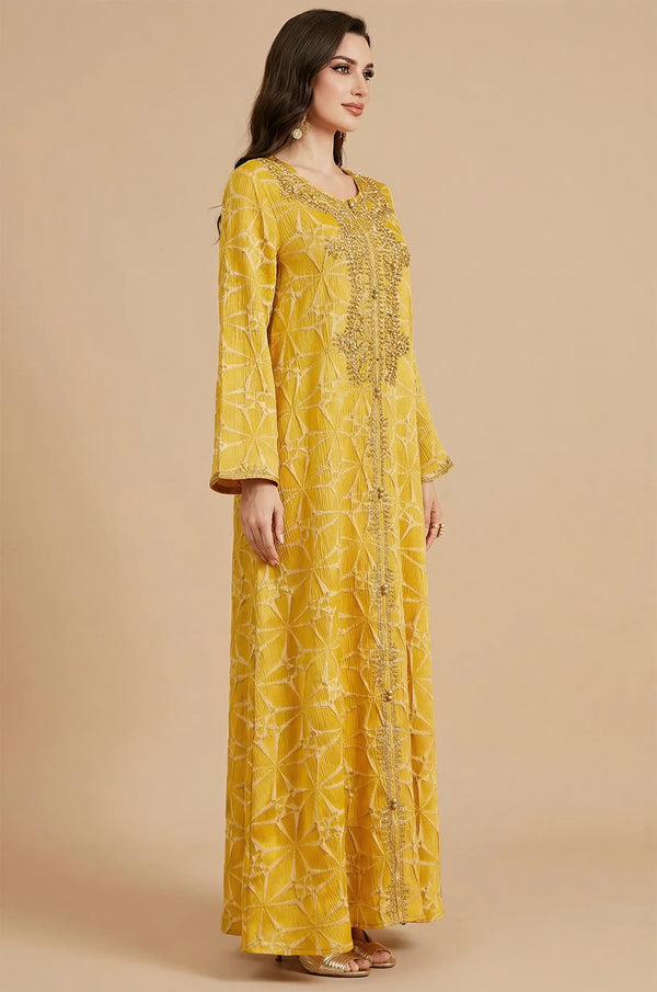 Side profile view of the Selas Yellow textured kaftan dress by Naylara on a neutral background.