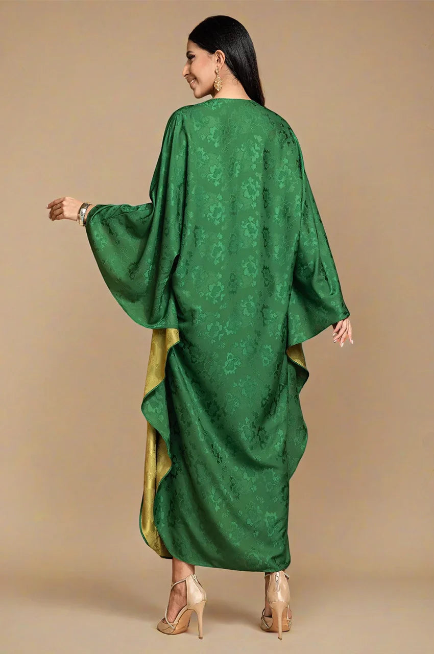 Back view of Selora green embellished silk kaftan featuring draped silk layers and jacquard texture